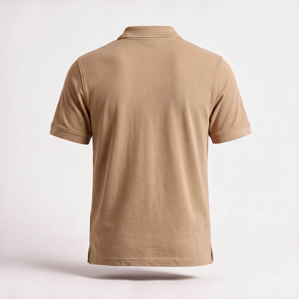 The Sahra Polo in sand, back — plain 240gsm cotton piqué, undecorated, with the ribbed collar and set-in sleeve seams